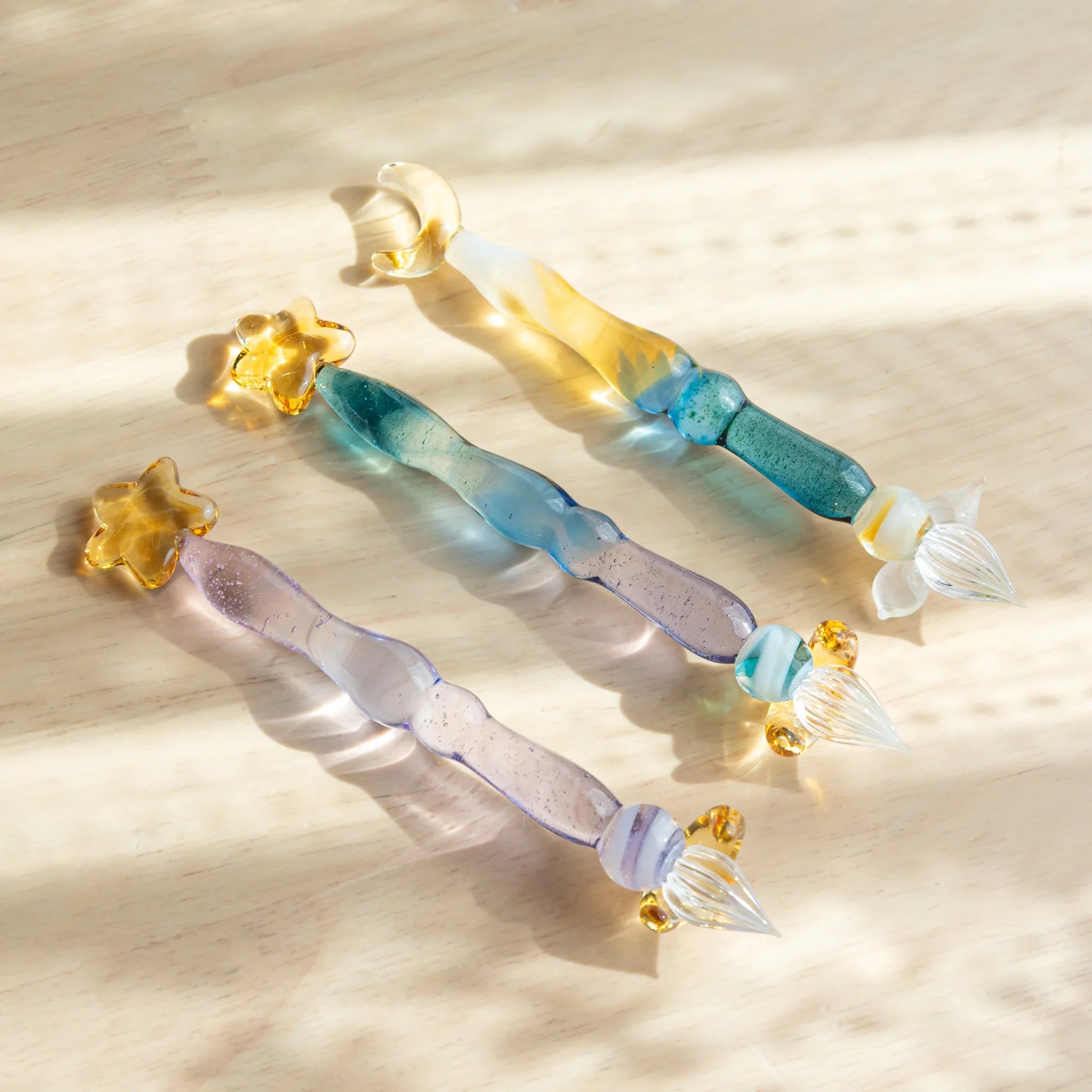 Purple Twilight Star Japanese glass dip pen with white feather brush and decorative gold star-shaped pen rest shine