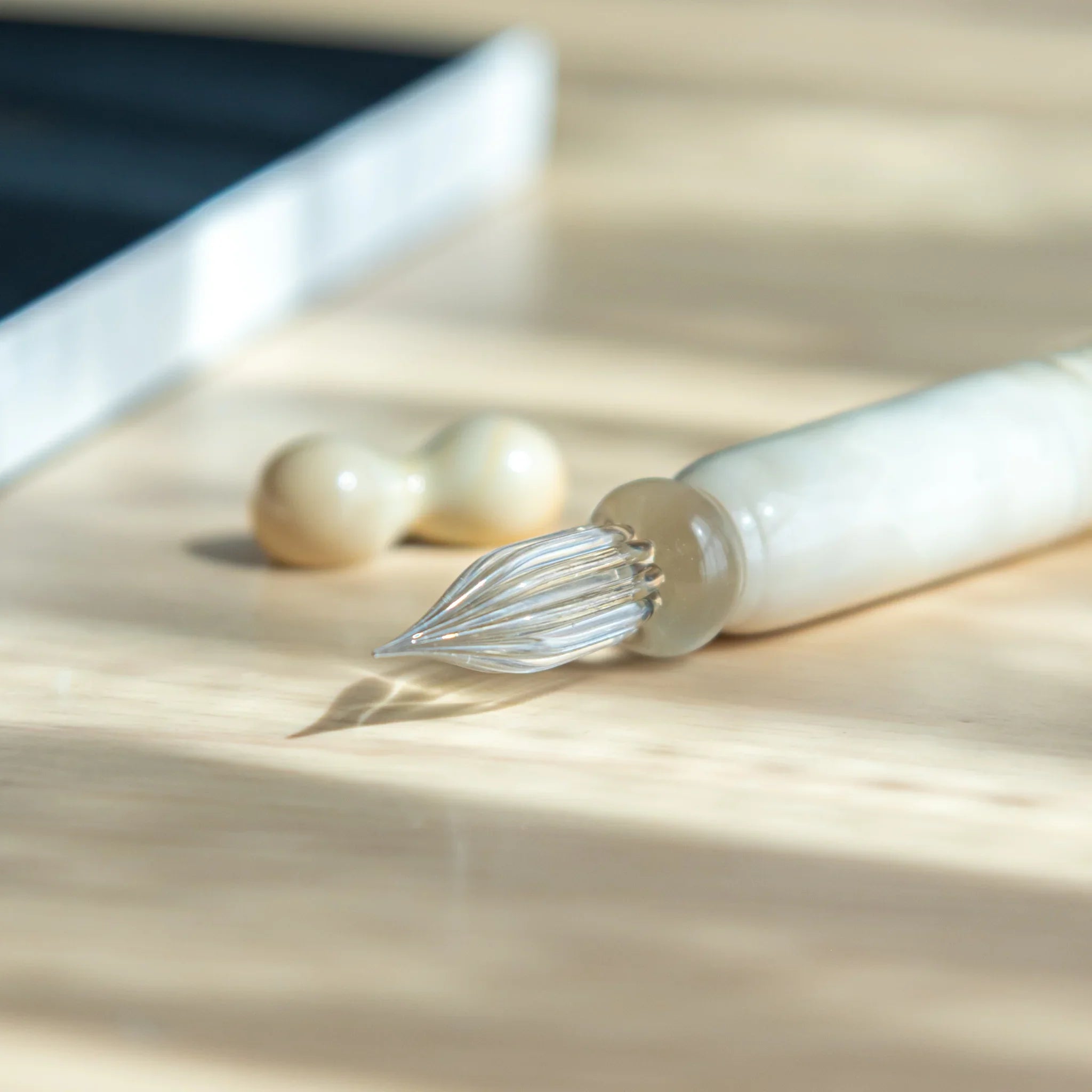 Two wooden spherical pen rests for white hemp leaves glass dip pen with traditional asa no ha pattern