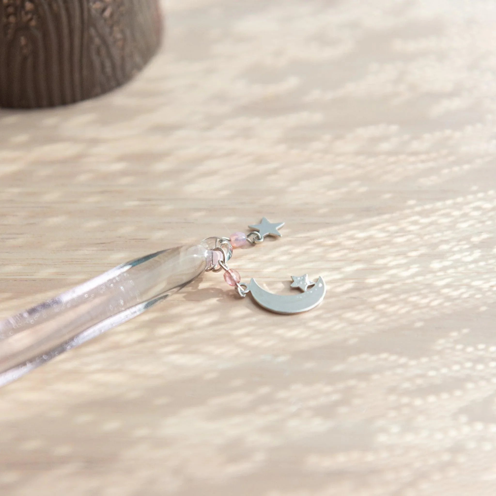 Wish upon a star pink glass dip pen displaying celestial decoration and stellar design element throughout pen art