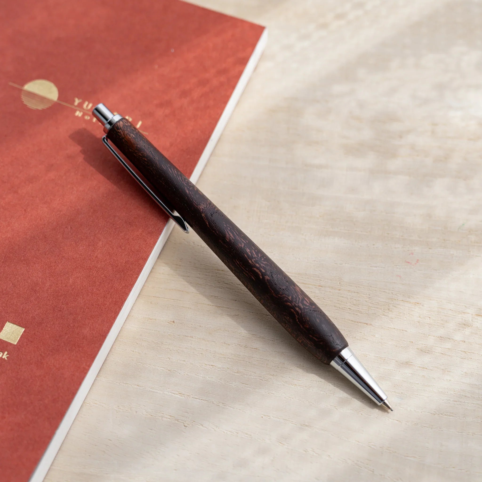 Zelkova wood urushi lacquered mechanical pencil in dark reddish-brown, Japanese keyaki wood, silver knock and tip
