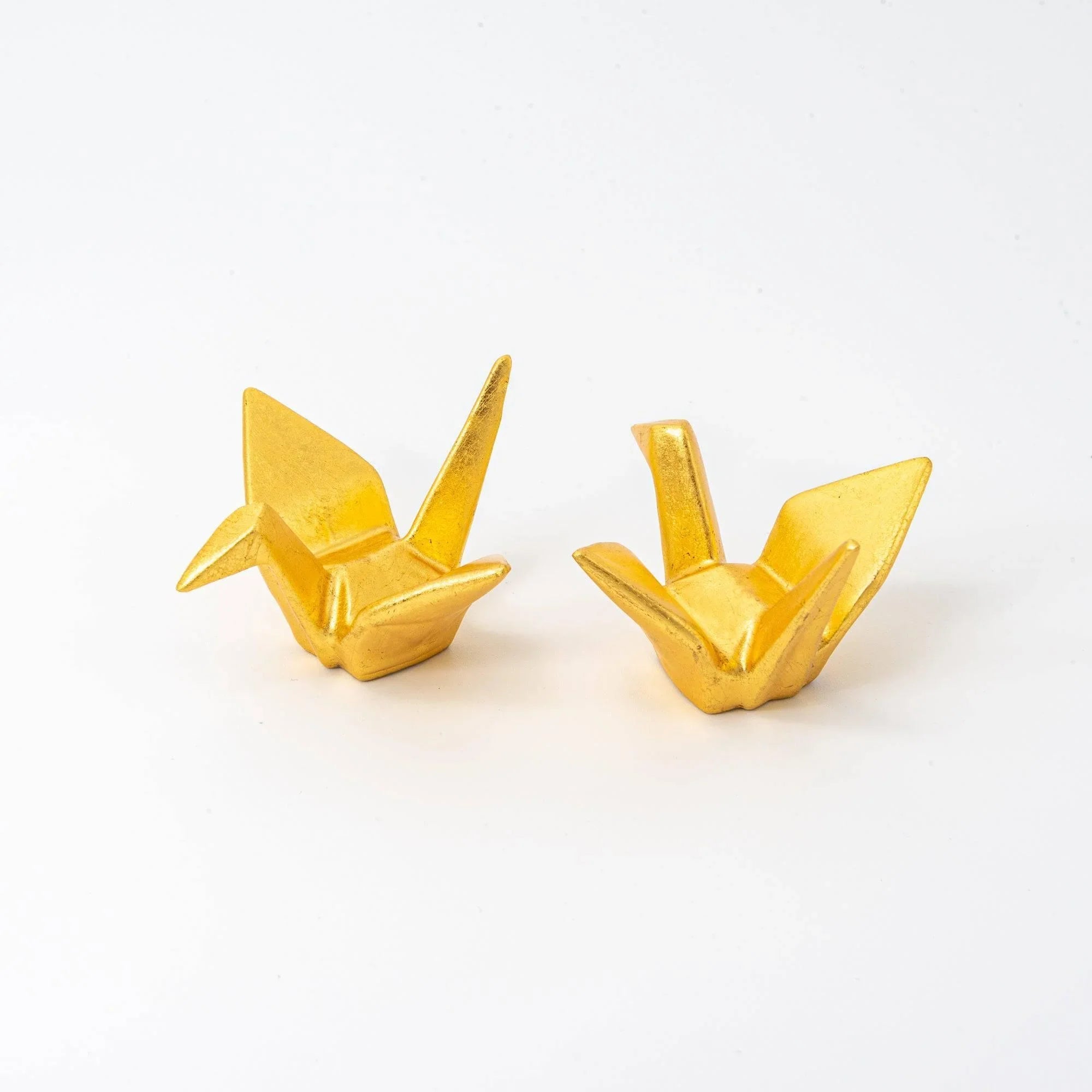 Japanese ceramic pen rest pair gold leaf crane design auspicious motif, front angled view on white background