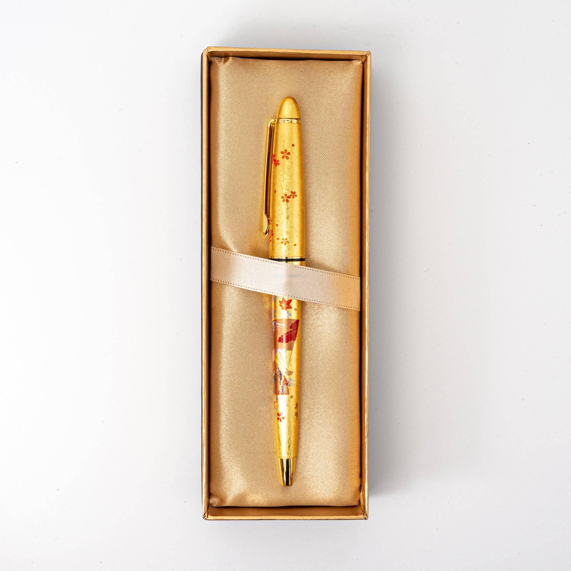 Close-up Gold Leaf Japanese Fan Makie ballpoint pen showing detailed fan ribs in delicate gold leaf design