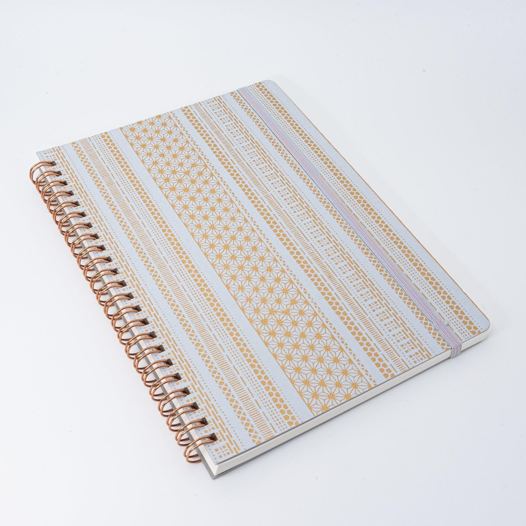 Golden traditional Japanese pattern A5 notebook with spiral binding and ornate cover with traditional Japanese craftsmanship
