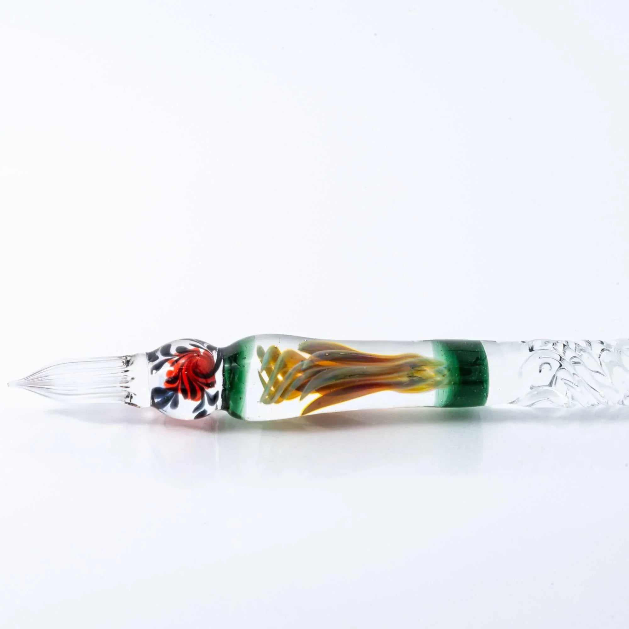 Japanese Orange Rose glass dip pen for lettering shown with metal nib tip and translucent orange barrel with holder