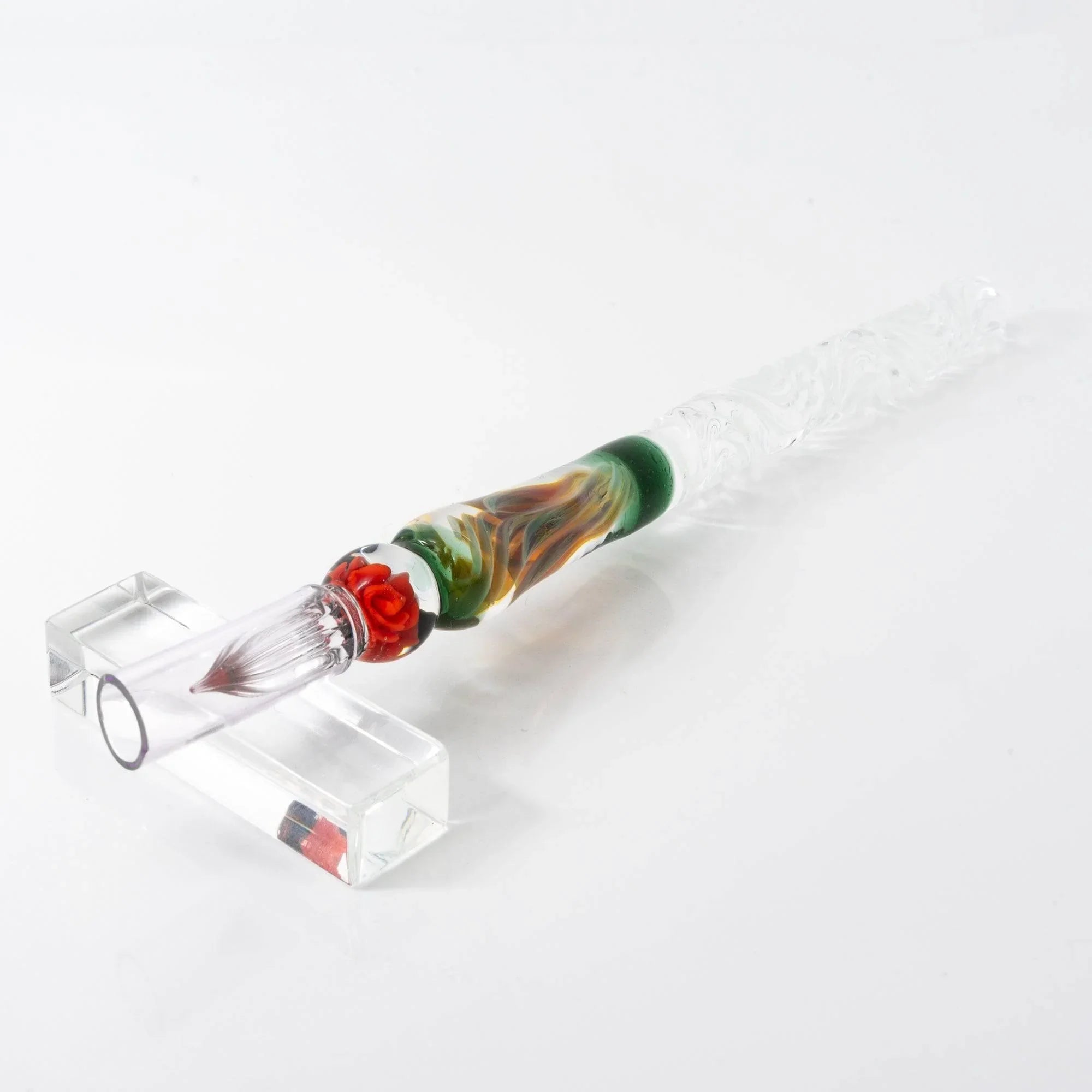 Orange Rose glass dip pen with metal nib displayed to show craftsmanship and orange glass quality shine