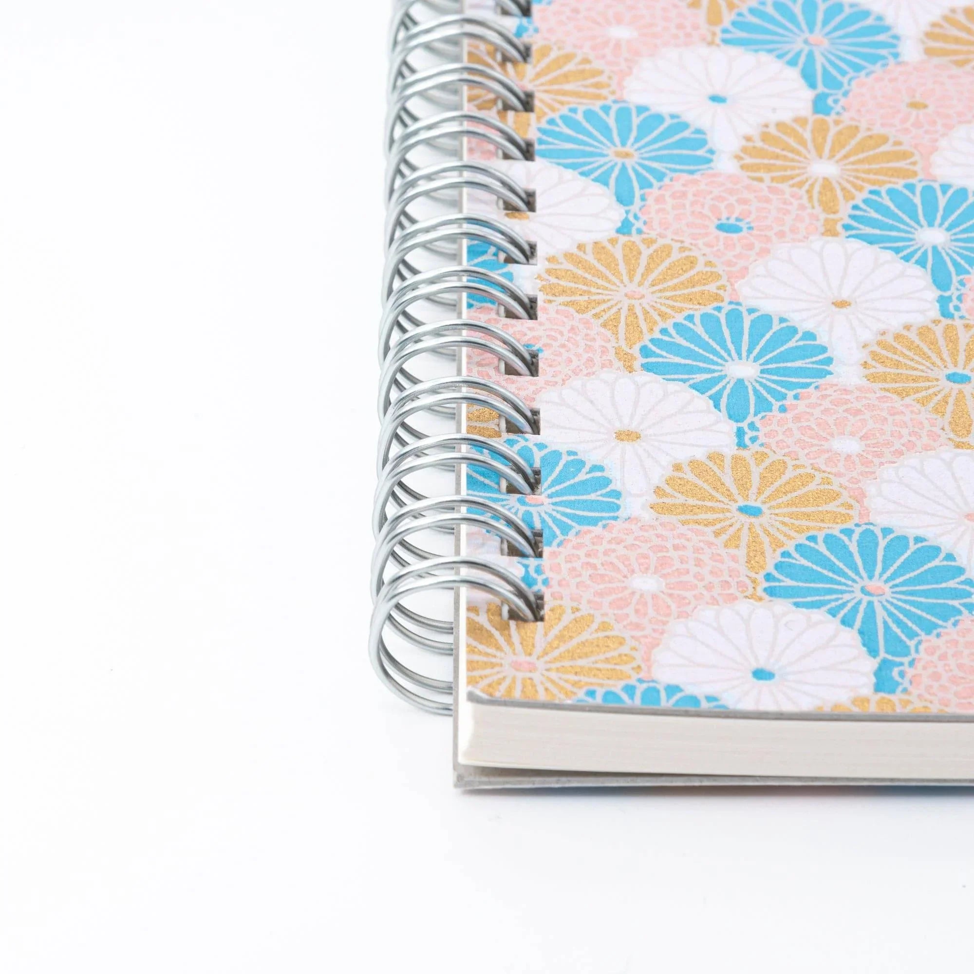 Sky Blossom Pastel Chrysanthemum Hand-Dyed Yuzen Washi Spiral Notebook (A5), lifestyle arrangement showing use