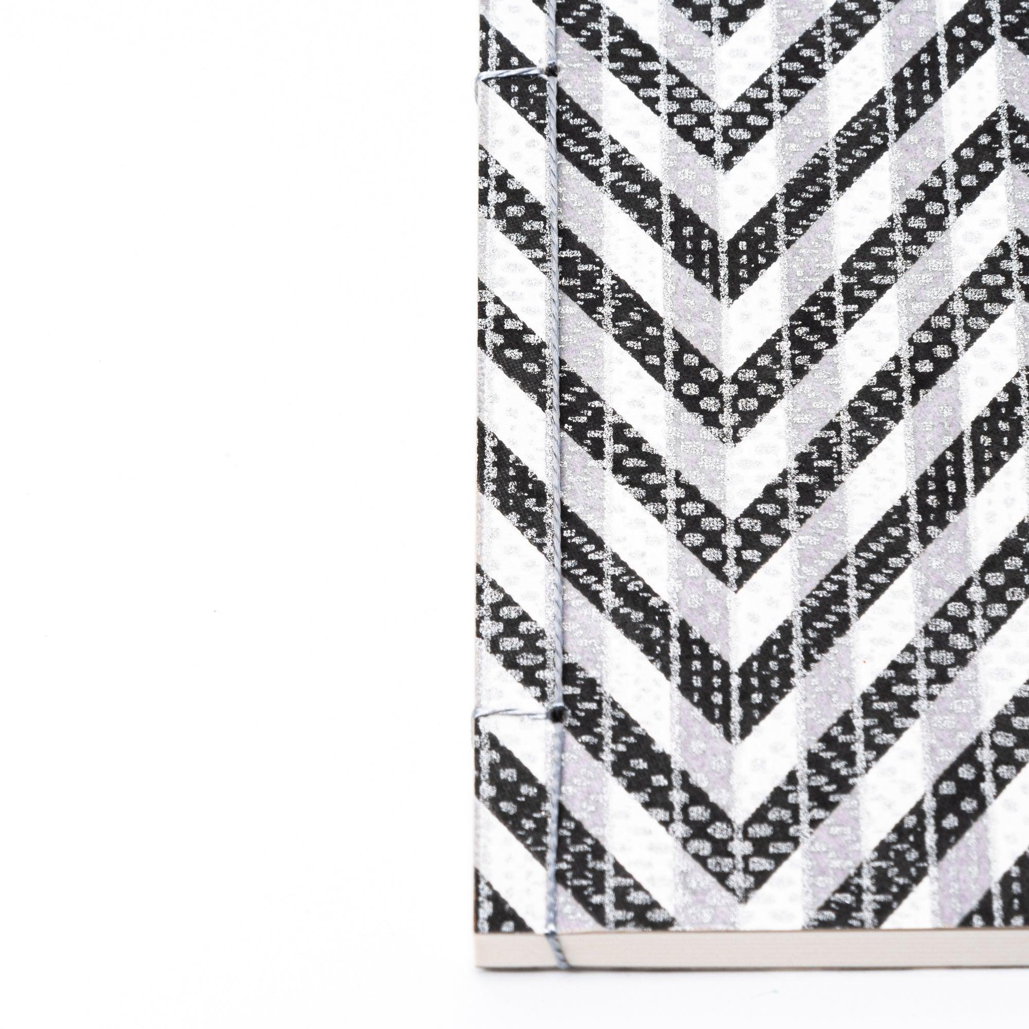 SOME PAD notebook black Yuzen washi with traditional Japanese binding and dark pages with traditional Japanese craftsmanship