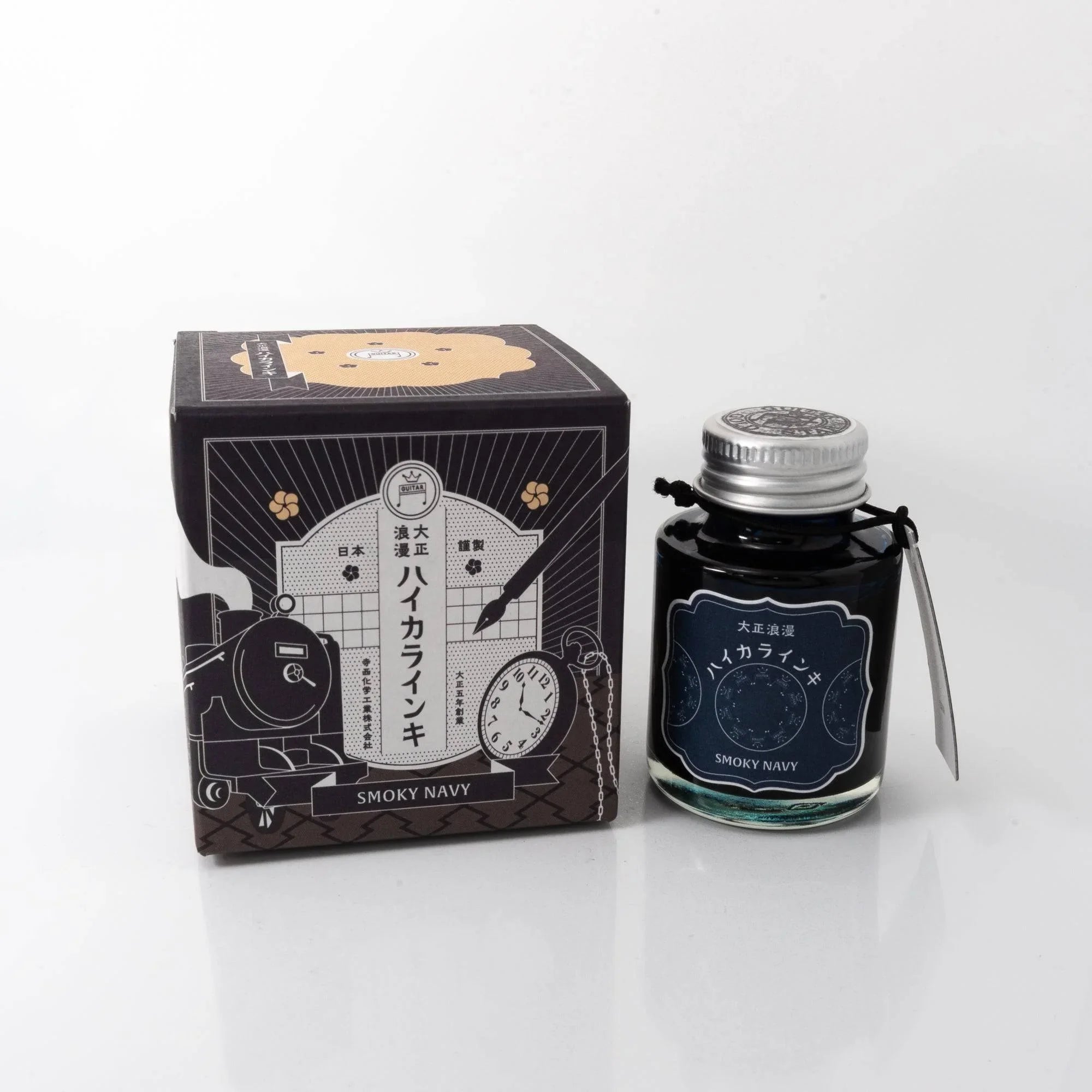 Taisho Romance Smoky Navy fountain pen ink in glass bottle displayed frontally against backdrop, Japanese fountain pen ink br