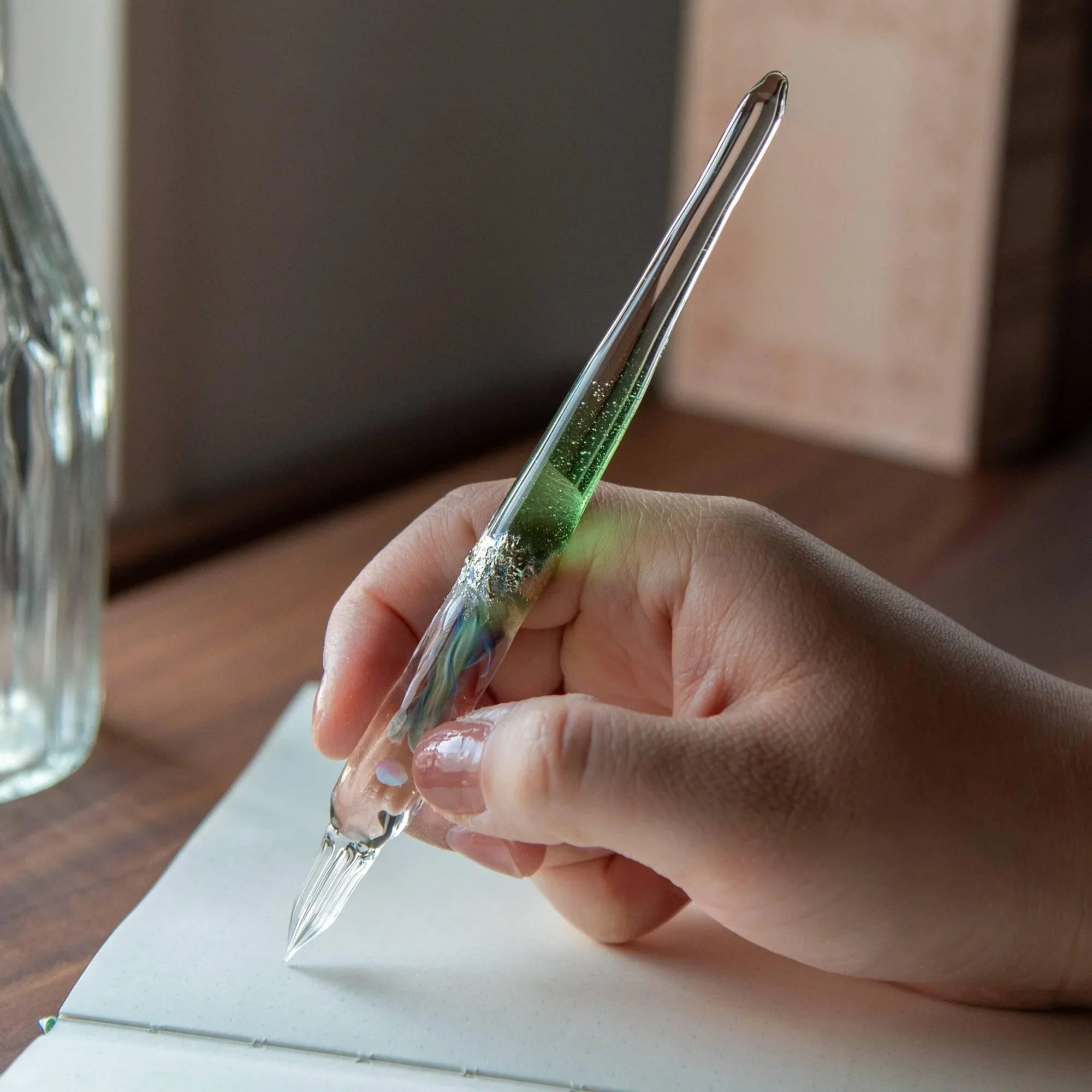 Japanese moon goddess inspired green glass dip pen featuring and twisted nib design shine