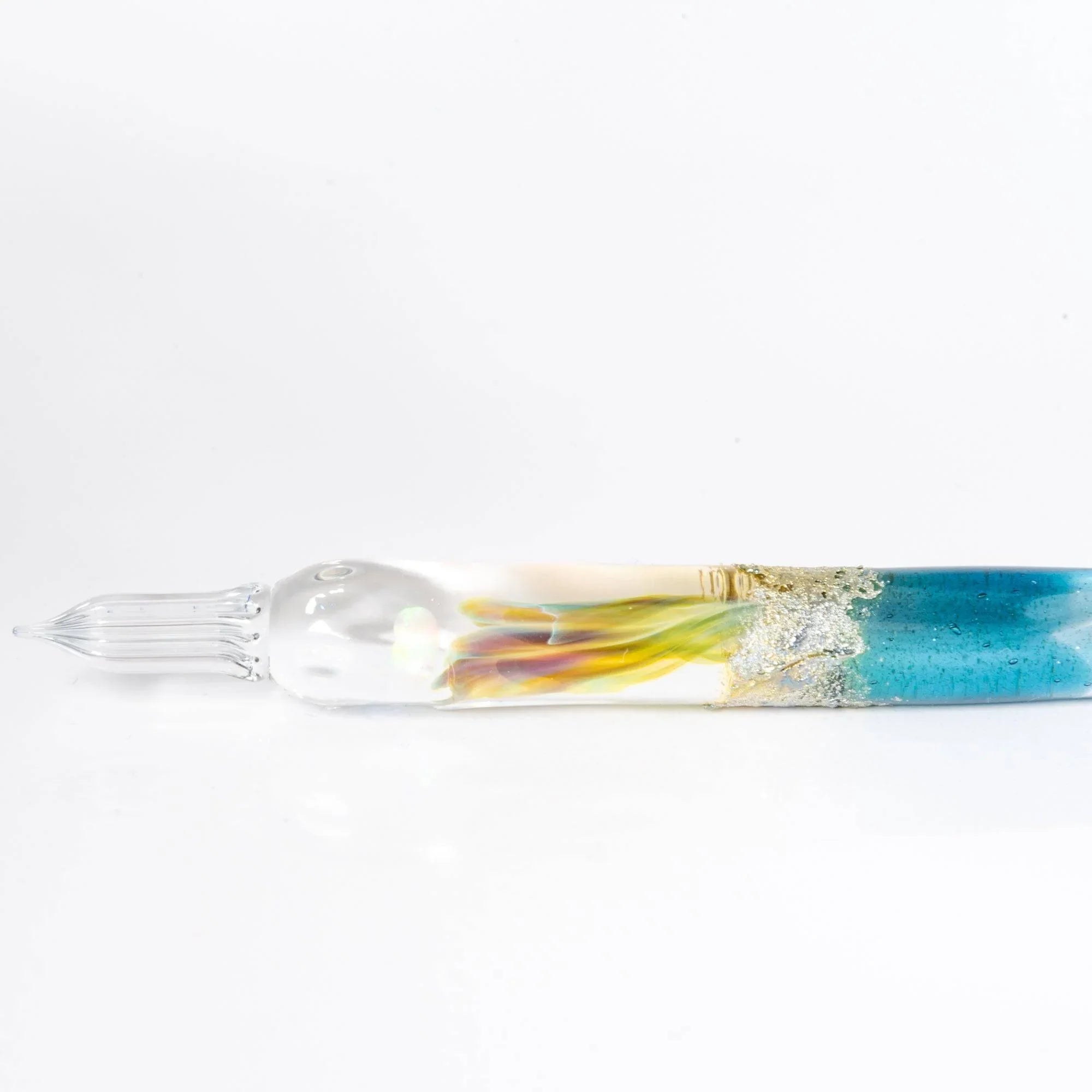 Tsukuyomi light blue glass dip pen featuring ethereal translucent color and artistic twisted nib craftsmanship