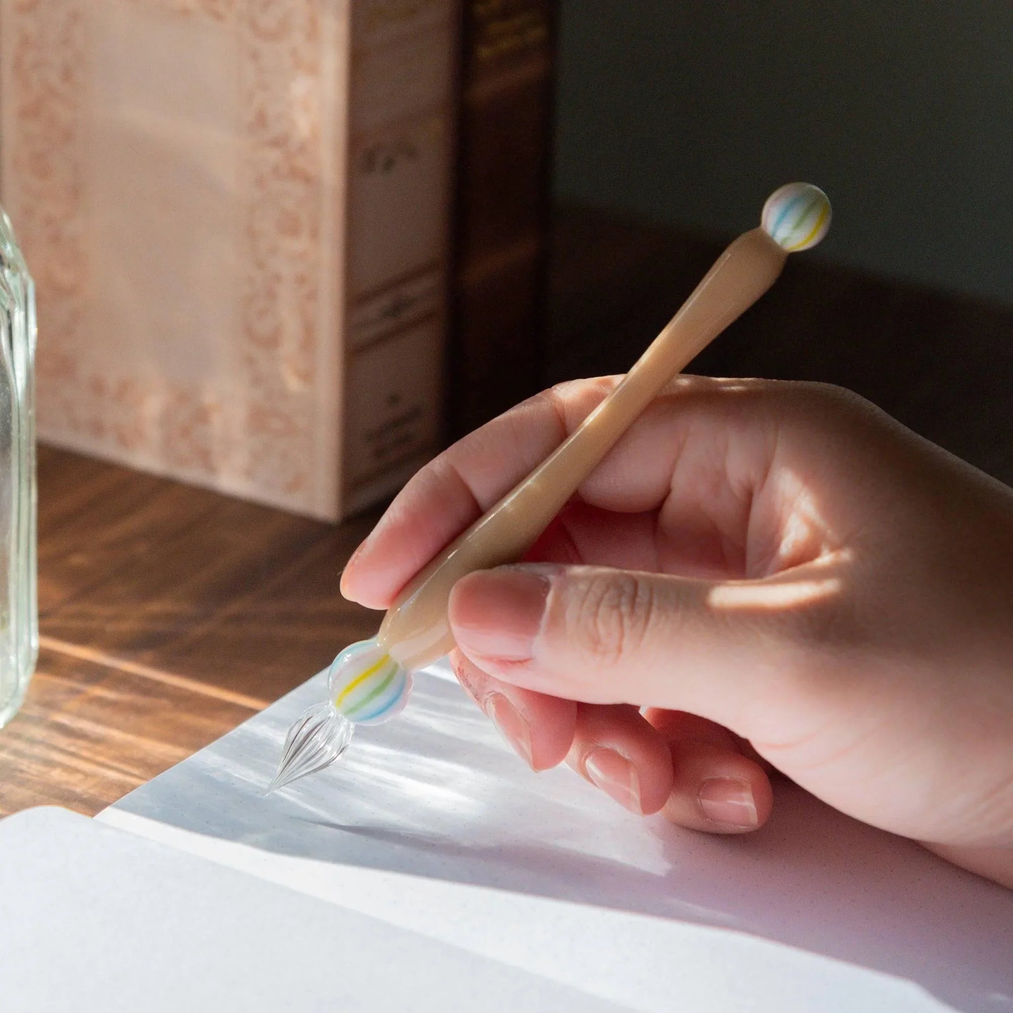 Wagashi Monaka glass dip pen showing cream colored glass barrel and layered wafer-inspired design detail